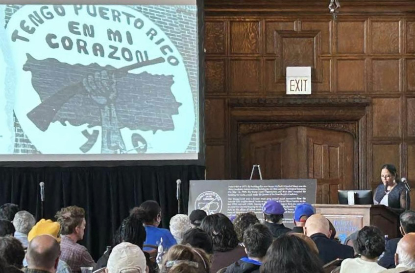 J Lazu giving a speech on the YLO marker